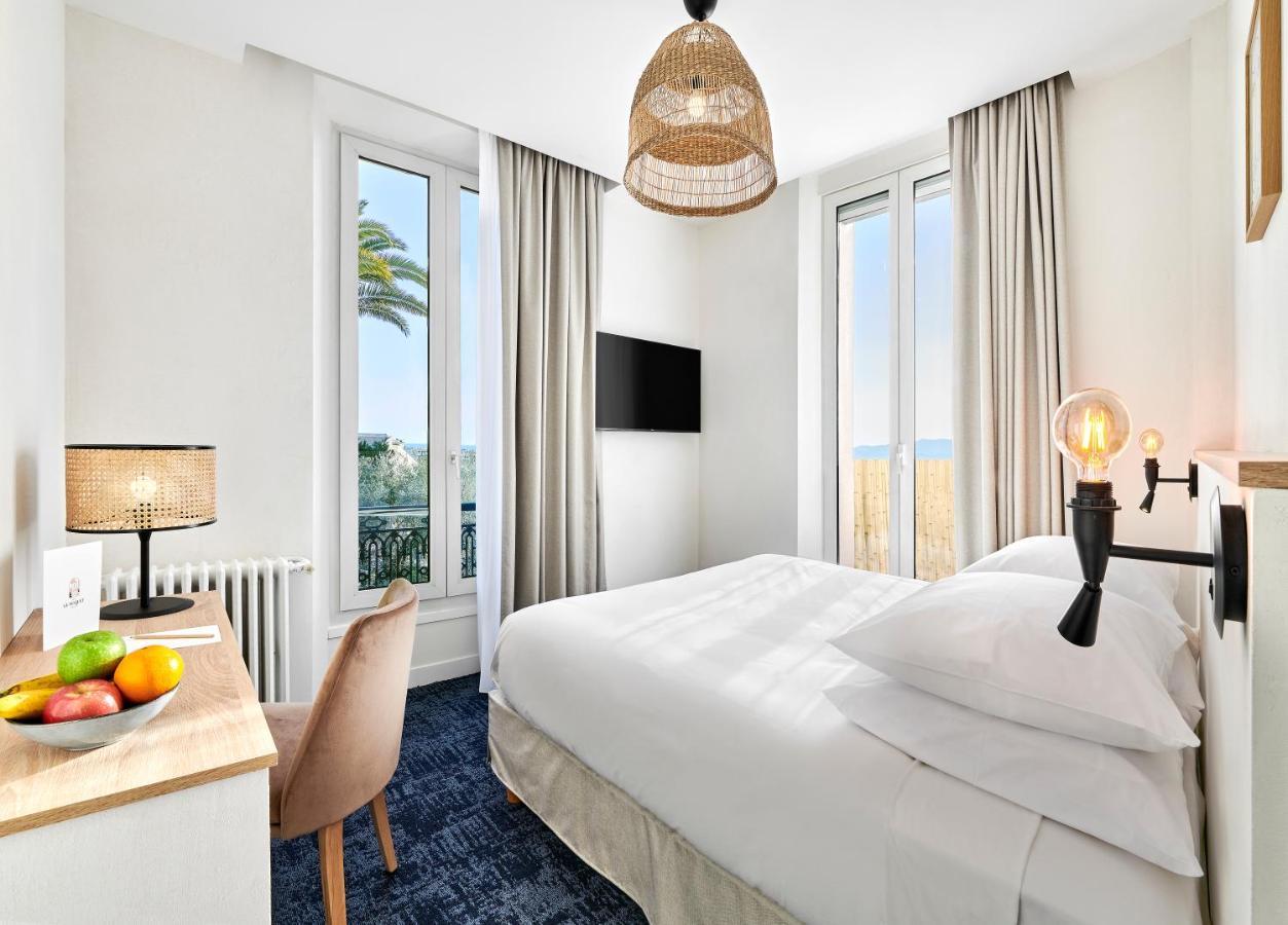 Hotel Le Suquet Cannes Bagian luar foto