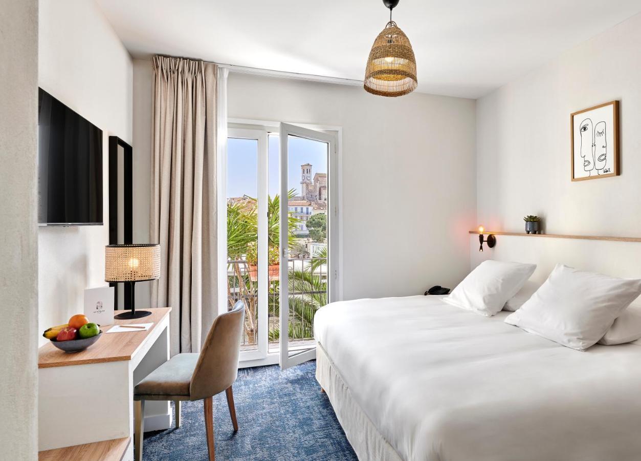 Hotel Le Suquet Cannes Bagian luar foto
